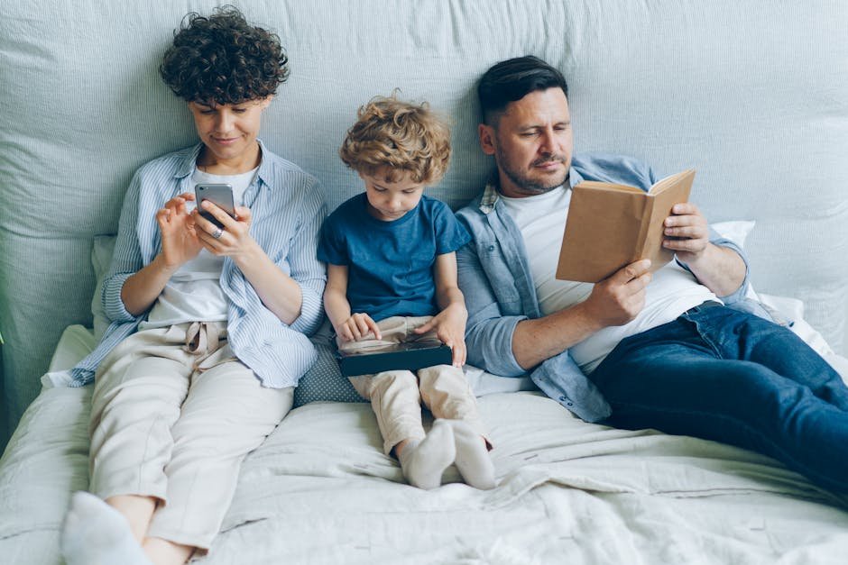 Family enjoying best IPTV service on multiple devices including smartphone tablet and television