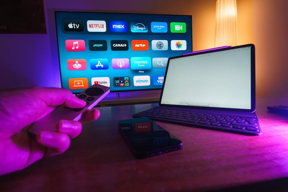 Multiple devices displaying Strong IPTV content including smartphone tablet and television